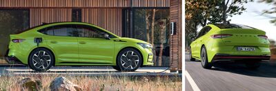 Grünes Škoda Auto Röhr Elektroauto wird geladen und fährt auf einer Landstraße bei sonnigem Wetter.