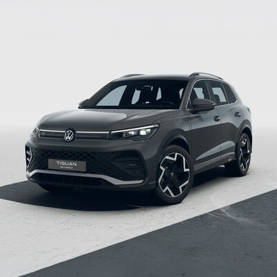 Der neue Volkswagen Tiguan eHybrid präsentiert sich in elegantem Grau vor einem neutralen Hintergrund bei Auto Röhr.