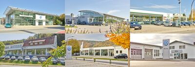 Moderne Autohäuser verschiedener Marken, darunter Volkswagen und Škoda, sind bei Auto Röhr in Passau zu sehen.